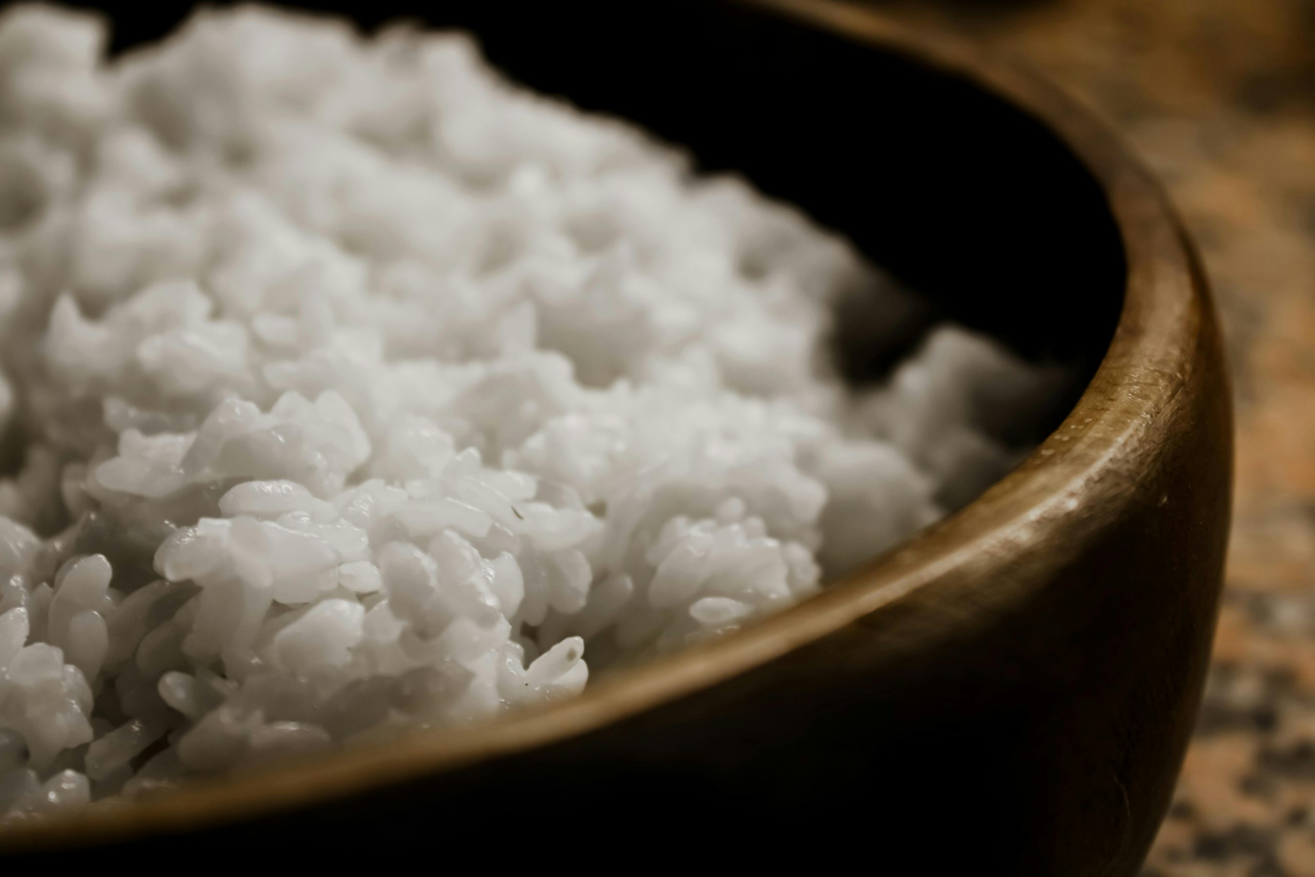 wooden bowl with cooked jasmine rice