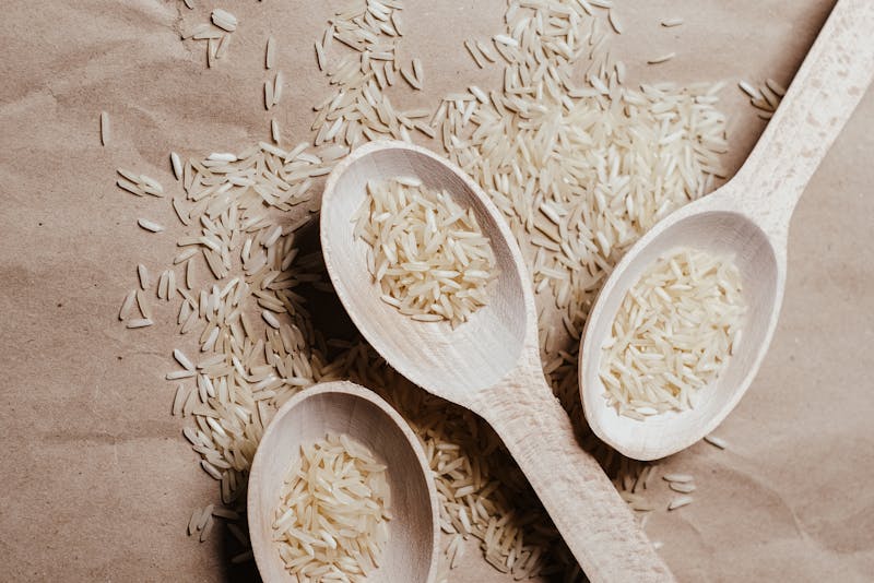 basmati rice and wooden spoons